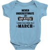 never underestimate an old man who was born in march Baby Onesie