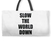 slow the world down Weekender Totes