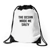 The Ocean Made Me Salty Drawstring Bags