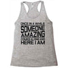 once in a while someone amazing comes along Racerback Tank