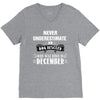 never underestimate an old man who was born in december V-Neck Tee