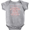 i wear my melanin like a badge of honor Baby Onesie