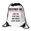 December Girl Drawstring Bags