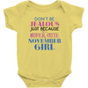 don't be jealous just because i'm a super cute november girl Baby Bodysuit