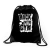 back in the gym Drawstring Bags