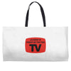 as seen in front of the the tv Weekender Totes