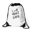 i don't care Drawstring Bags