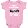 never underestimate an old man who was born in october Baby Onesie