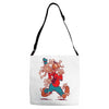 the flying spaghoofy monster Adjustable Strap Totes