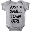just a small town girl Baby Onesie