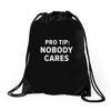nobody cares Drawstring Bags