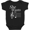 she wants the d black Baby Bodysuit