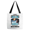 Never Underestimate A Man Who Watches Lost in Space And Was Born in De Tote Bags