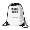 great in bed Drawstring Bags